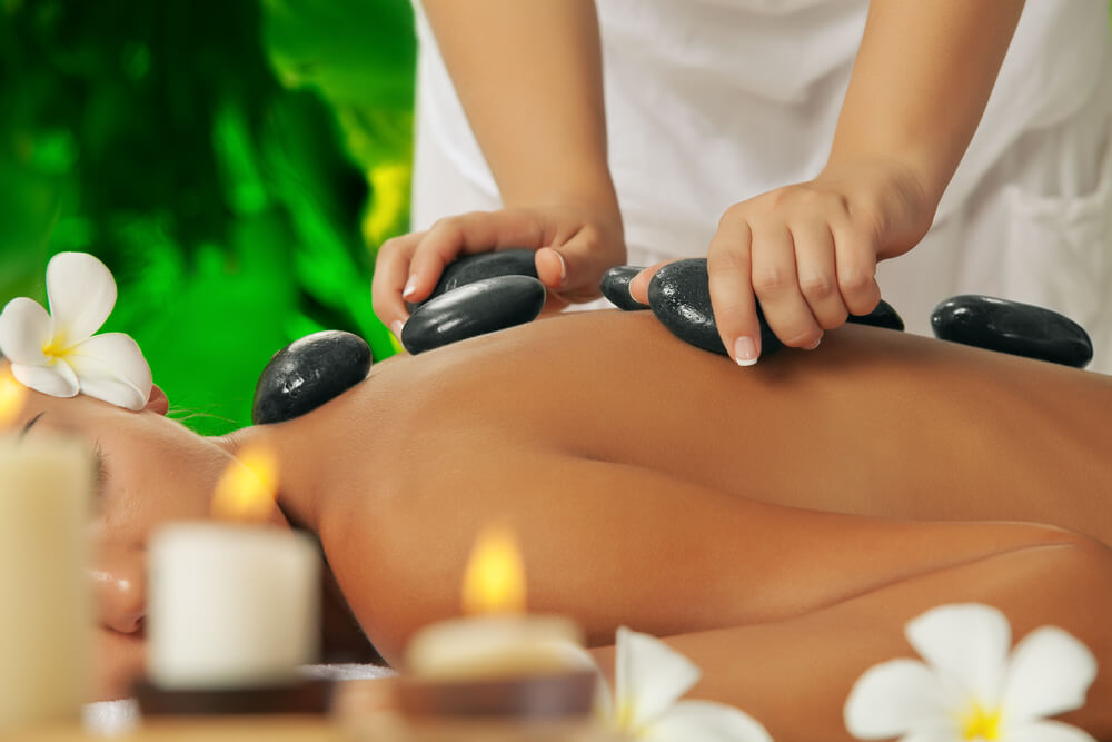 What Are the Health Perks of a Hot Rock Massage Therapy?